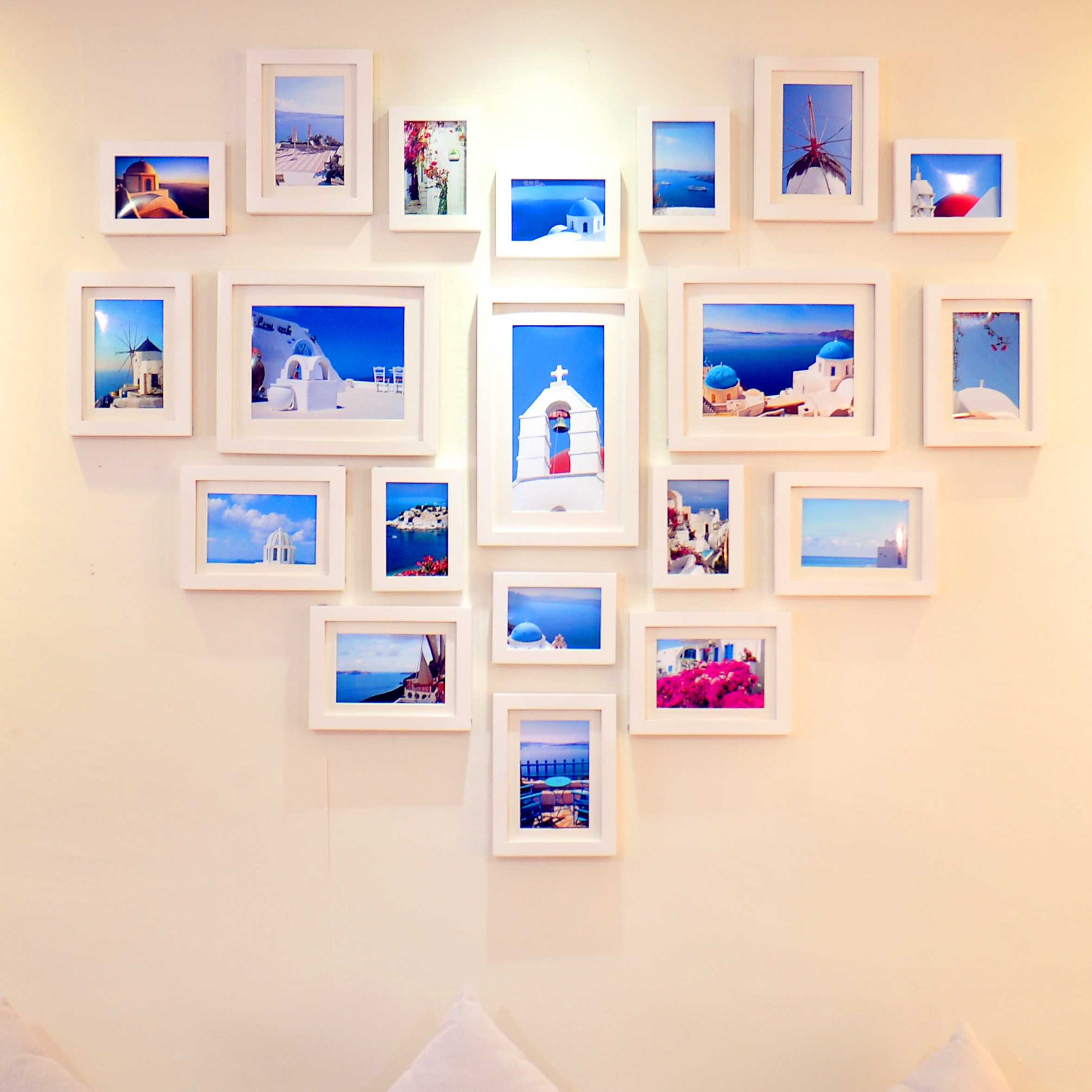 Как красиво повесить фотографии на стену - схемы и 50 фото