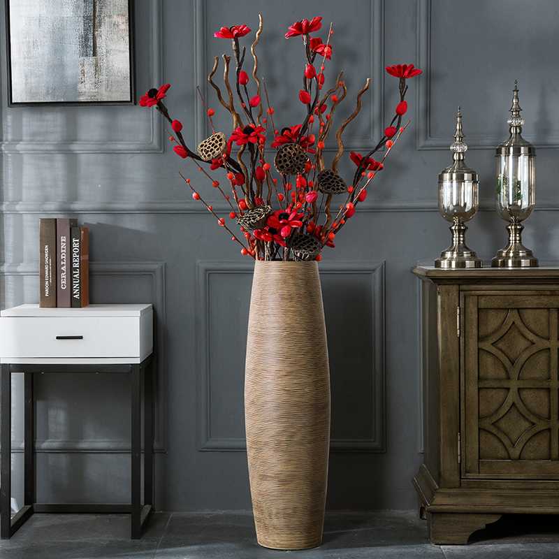Напольные вазы в интерьере, обзор форм, стилей и материалов, как выбрать место в комнате и чем наполнить - 40 фото